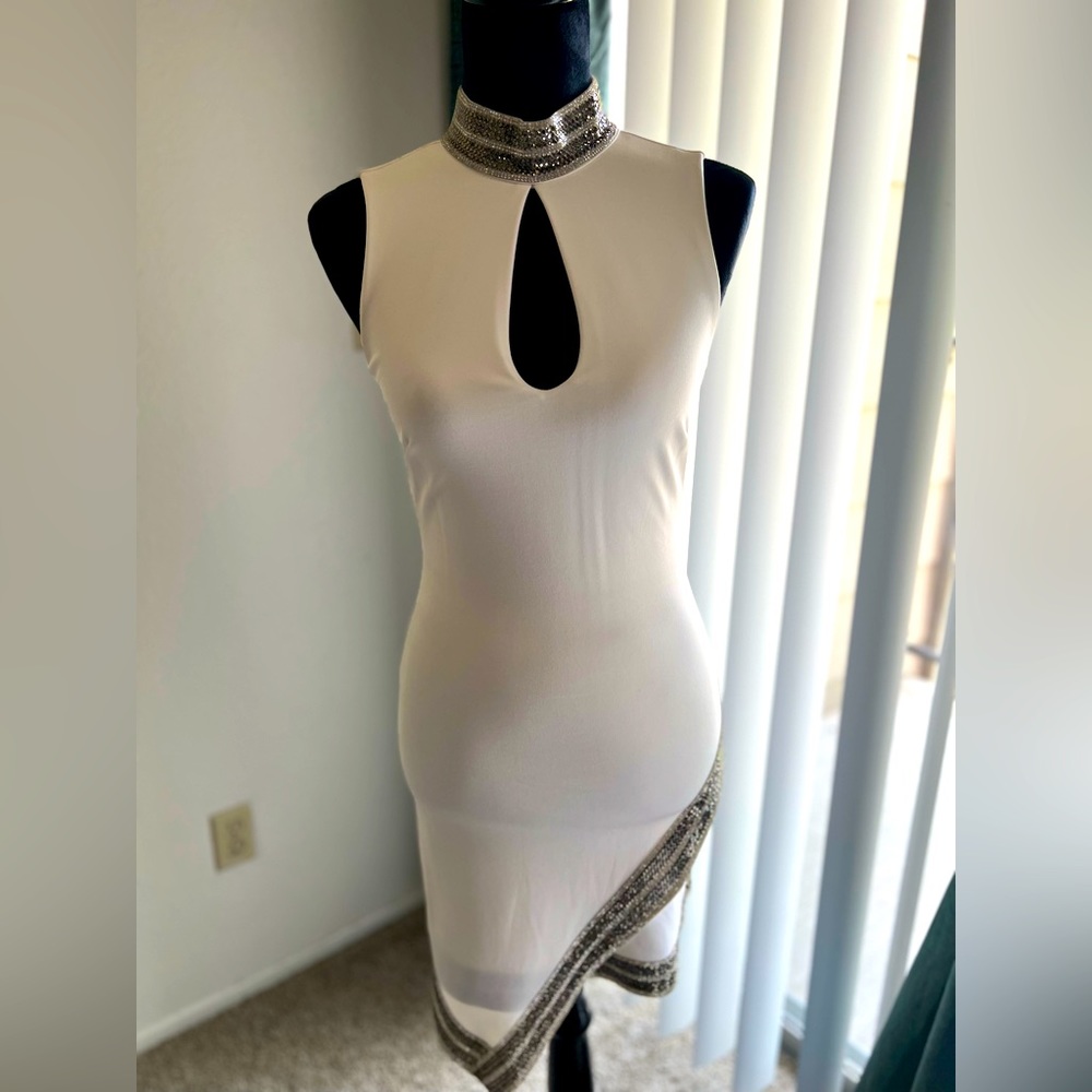 Bebe white dress whit really cute rhinestones